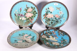 Four Oriental cloisonné enamel wall chargers, each decorated with birds and flowers, 30cm