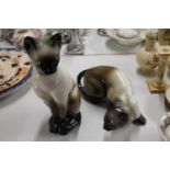 Pair of Siamese cats, larger 38cm.