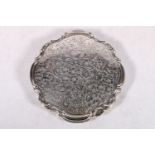 Sterling silver compact with all-over incised floral and scroll design and C-scroll border, 9cm