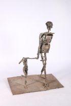 Contemporary metal sculpture of an adult and child, 46cm tall. #423