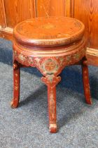A circular red lacquer Chinese stool, with gilt design, 36cm diameter. #95