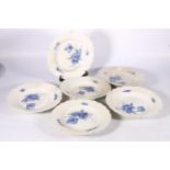 Set of six Royal Copenhagen blue and white porcelain soup plates with handpainted floral design,