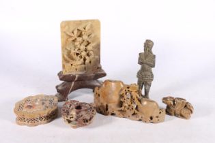 Chinese carved soapstone table panel on stand, decorated with relief fruiting tree and bird, 20cm