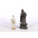 Oriental bronzed pewter or lead figure of a gentleman in robe, on wooden stand, 23cm high and a