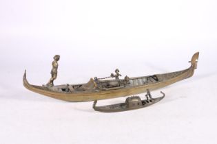 Cast bronze model of a gondola with standing figure, 50cm long, and another.  (2)