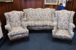 A Georgian style three-seat suite comprising sofa and two armchairs, upholstered in brocade,