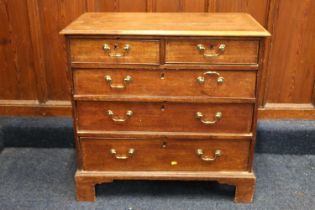 19th century mahogany chest of drawers, the rectangular top with moulded edge above two short frieze
