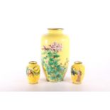 Yellow ground cloisonné enamel vase, with chrysanthemum design, 30cm high, and a pair of smaller