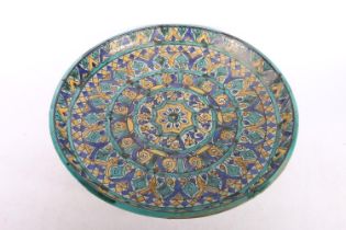 Large Persian Iznik style pottery footed bowl with turquoise, blue and yellow geometric