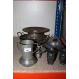 Pewter two handled vases marked Craftsman with portrait to base, 15cm, two Japanese bud vases marked