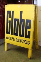 Globe Soft Drinks advertising board.