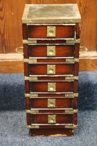 Reproduction campaign styleminiature brass bound column chest of six drawers, 52cm tall.
