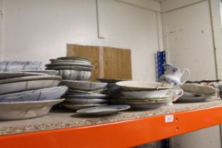 Shelf of china, blue and white, Wedgewood, cups, bowls, etc.