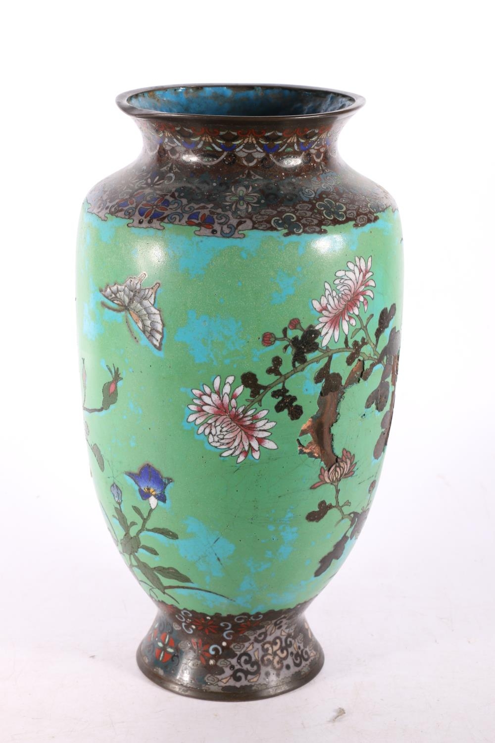 Large Chinese cloisonné baluster vase, the green blue ground decorated with flowers and insects,