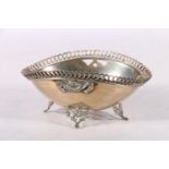 Continental 925 silver oval sugar bowl with ring link border, raised on ornate scroll feet,