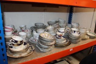 Shelf of china, cups, saucers, bowls, etc.