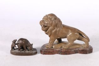 Bronzed resin bear and cub group, 7cm long, and a European stone carving of a lion on base, 13.5cm