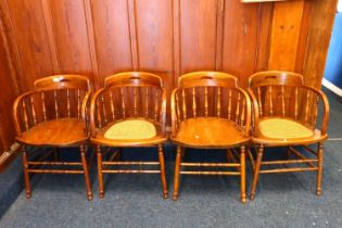 A set of eight oak captains chairs (two with caned seats) #385