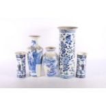 Oriental blue and white porcelain vases, the largest of column form with four character mark to