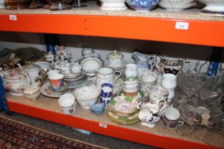 Shelf of china to include tea pots, cups, saucers, jugs, also quantity of plate stands.