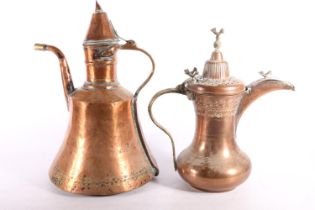 Two Middle Eastern copper coffee pots, 35cm and 31cm high. (2) #215