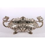 19th century Portuguese silver rose bow of oval shape with fitted ornate flower spreader, eagle