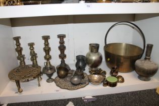 Group of candlesticks, also opera glasses, bell, trivets, etc.