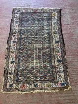 North west Persian rug, field with bean or chili motif, well worn, 161 x 107cm.