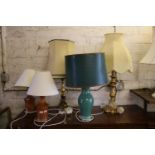 Five standard table lamps with shades.