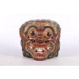 Chinese carved painted and gilded wood dragon mask, 15cm high.