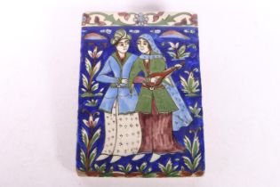 Iznik Persian Qajar period plaque depicting a man and a woman, 24cm x 17cm. (a/f) #188