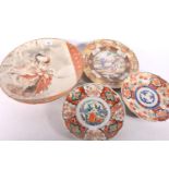Oriental gilt painted porcelain plate, with family scene, 25cm diameter, a hand painted Japanese