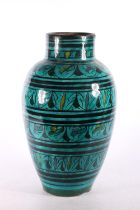 Large ceramic Persian vase of baluster form, decorated with turquoise and black bands of flowers,