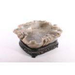 Carved soapstone bowl, on stand of rectangular form, 22cm long #68, and another. (2)