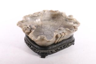 Carved soapstone bowl, on stand of rectangular form, 22cm long #68, and another. (2)