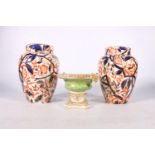 A pair of Derby vases decarated in the Imari palate, 18cm tall, and a Derby pastille burner, 9cm