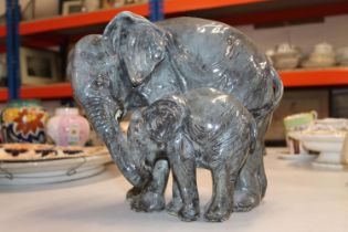 Elephant figural group, 30cm.