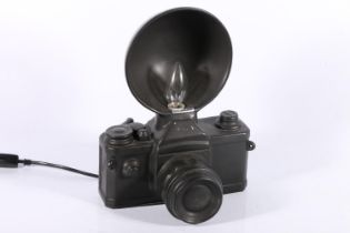 Novelty table lamp in the form of a camera, 31cm high.