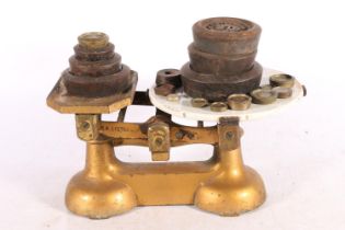 R A Lister & Co. set of vintage scales and weights.