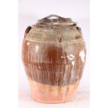 Large terracotta salt-glazed olive jar and cover, 58cm.