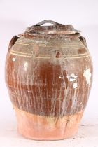 Large terracotta salt-glazed olive jar and cover, 58cm.