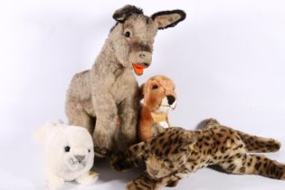 Collection of Steiff animals to include 'Grissy the Donkey', leopard, fawn and seal pup. (4)