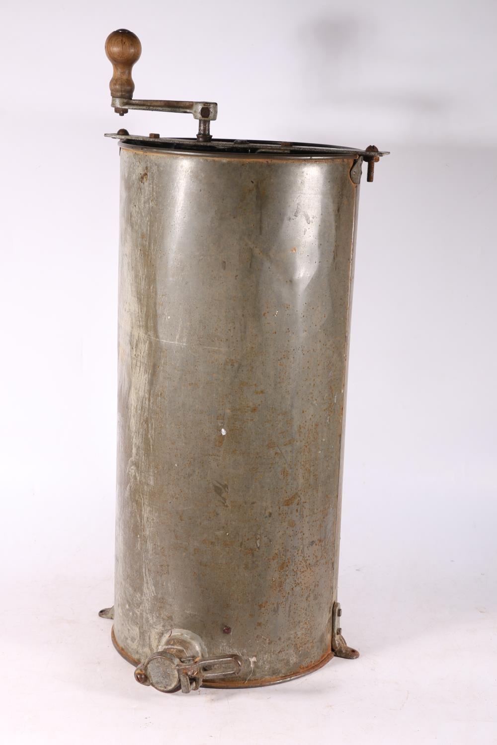 Galvanized metal honey extractor, 72cm high.