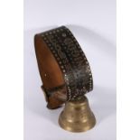 Brass cowbell with leather strap decorated with studs, reading Club DeSports, Manigod, bell measures