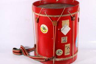 Red-painted drum.