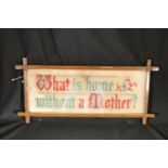 Early 20th century framed sampler,  'What is Home Without a Mother', 57cm wide.