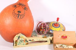 Vintage tinplate and other toys to include a spinning top, a Japanese clockwork circus toy, a