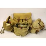 Four fishing bags and fishing tackle to include hooks, flies, etc.