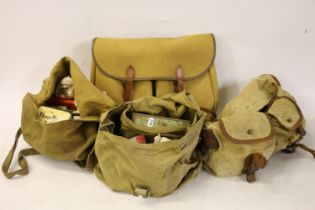 Four fishing bags and fishing tackle to include hooks, flies, etc.