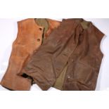 Two leather vintage waistcoats.